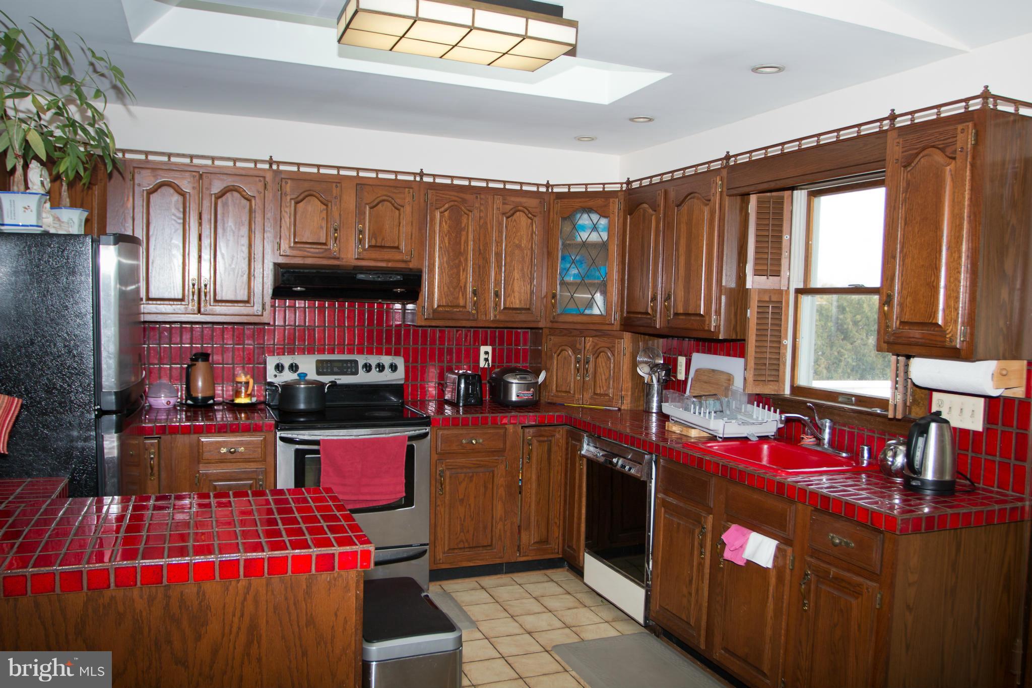 1303 Westburn Road Baltimore, MD 21228 - Photo 6 of 26 Kitchen with SS appliances