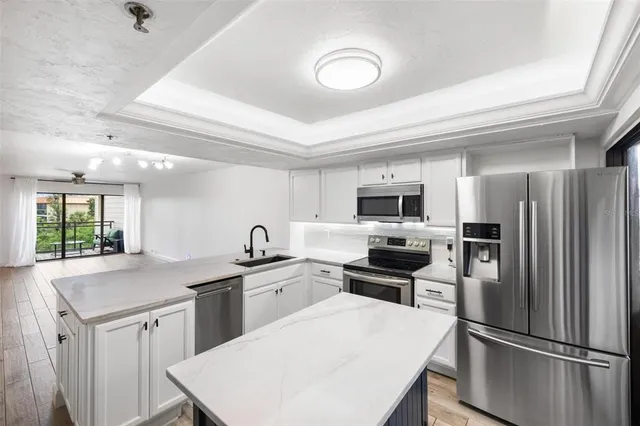 a bathroom with a mirror and a sink