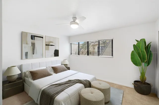 a bathroom with a double vanity sink mirror and shower