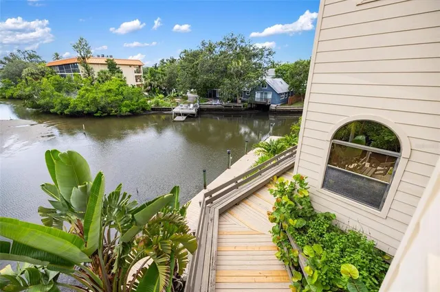 a view of a lake with a house