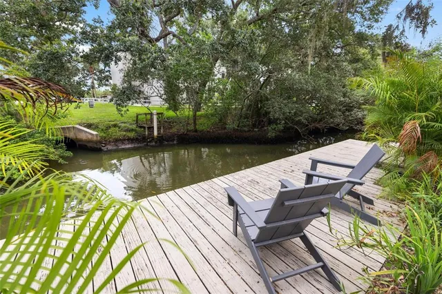 an aerial view of a house with a garden