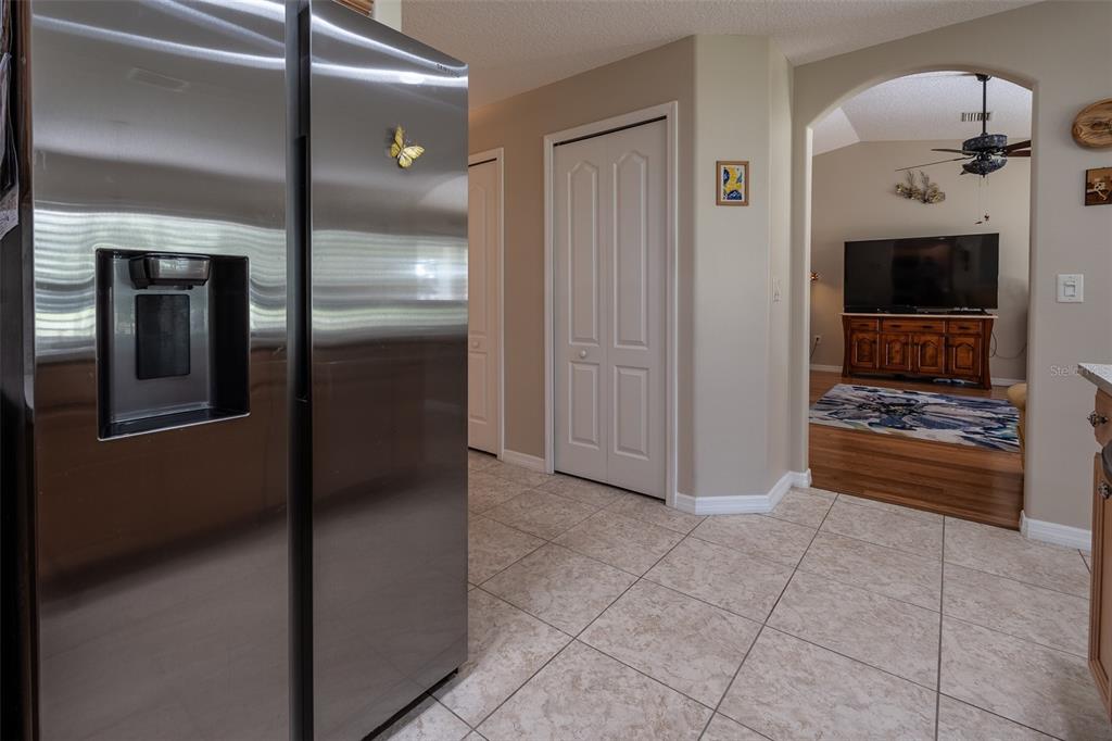 16023 Southwest 14th Avenue Road Ocala, FL 34473 - Photo 15 of 57 a view of a kitchen from the hallway