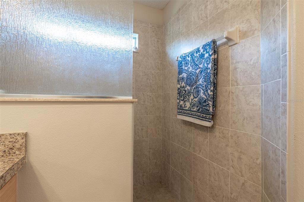 16023 Southwest 14th Avenue Road Ocala, FL 34473 - Photo 29 of 57 a bathroom with a shower