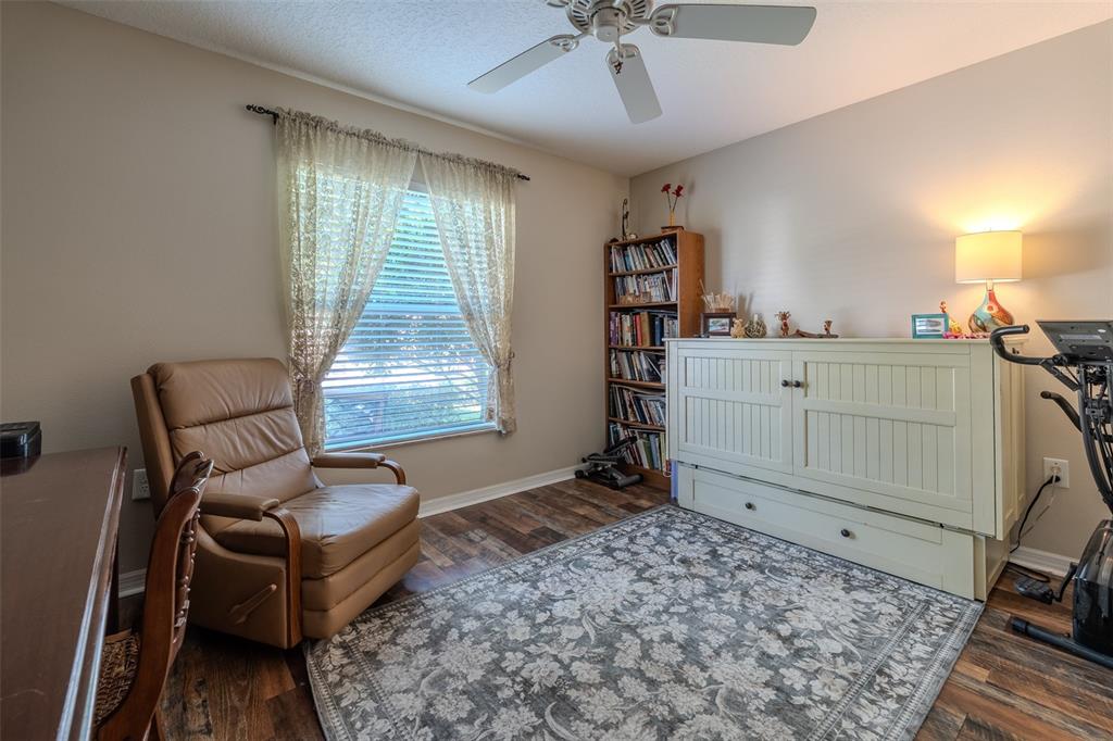 16023 Southwest 14th Avenue Road Ocala, FL 34473 - Photo 33 of 57 a room with furniture and window