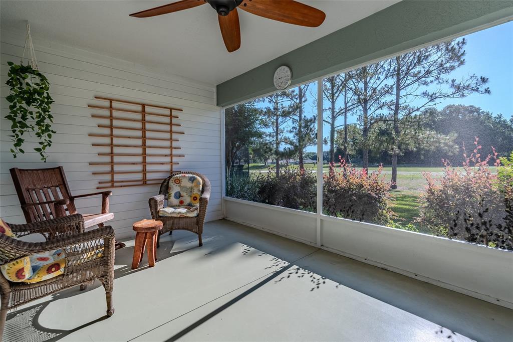 16023 Southwest 14th Avenue Road Ocala, FL 34473 - Photo 43 of 57 a living room with furniture and a window