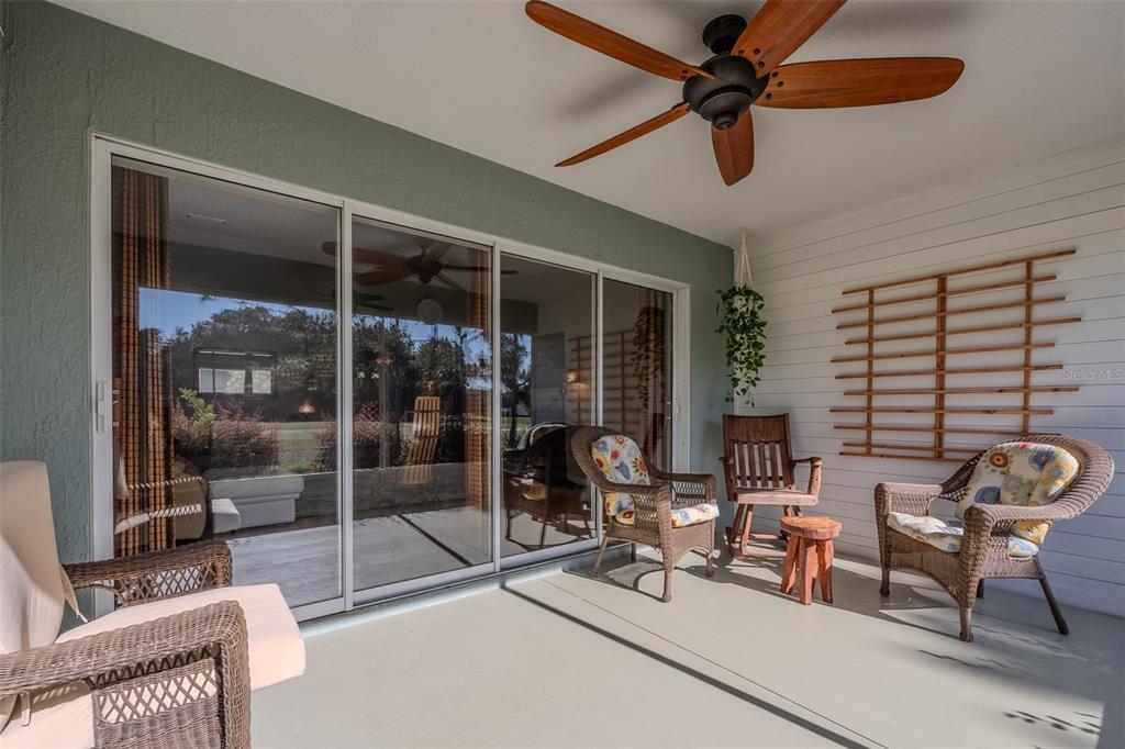16023 Southwest 14th Avenue Road Ocala, FL 34473 - Photo 44 of 57 a room with gym equipment and a large window