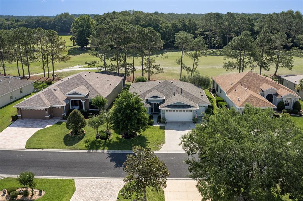 16023 Southwest 14th Avenue Road Ocala, FL 34473 - Photo 54 of 57 an aerial view of a house with garden space and street view