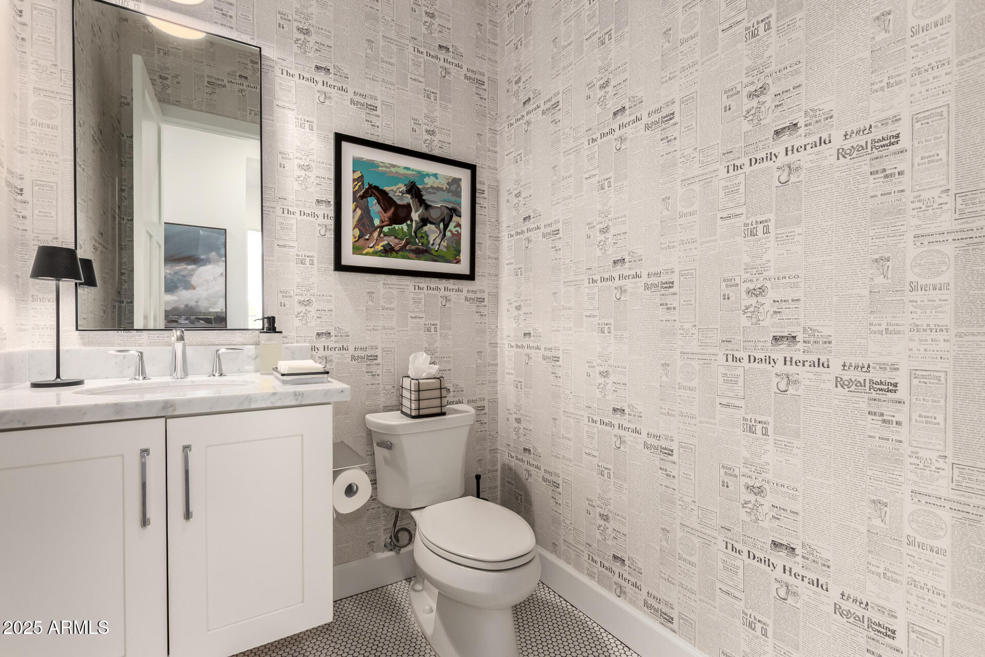 8723 North 9th Avenue Phoenix, AZ 85021 - Photo 27 of 34 a bathroom with a toilet sink and mirror