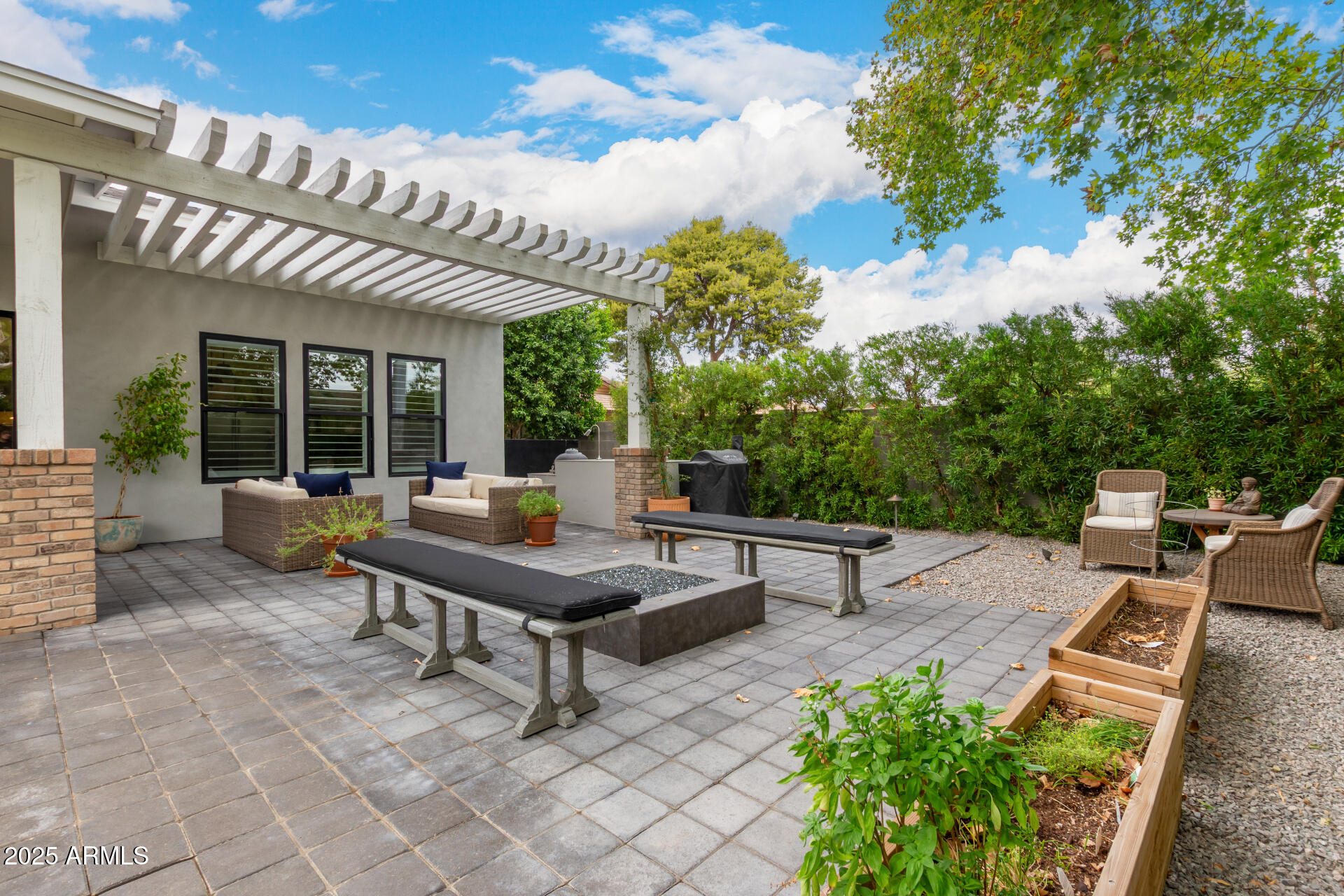 8723 North 9th Avenue Phoenix, AZ 85021 - Photo 29 of 34 a backyard of a house with outdoor seating