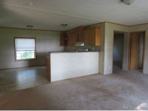 14609 Fairview Road St. Paul, VA 24283 - Photo 5 of 18 Living Room into Kitchen