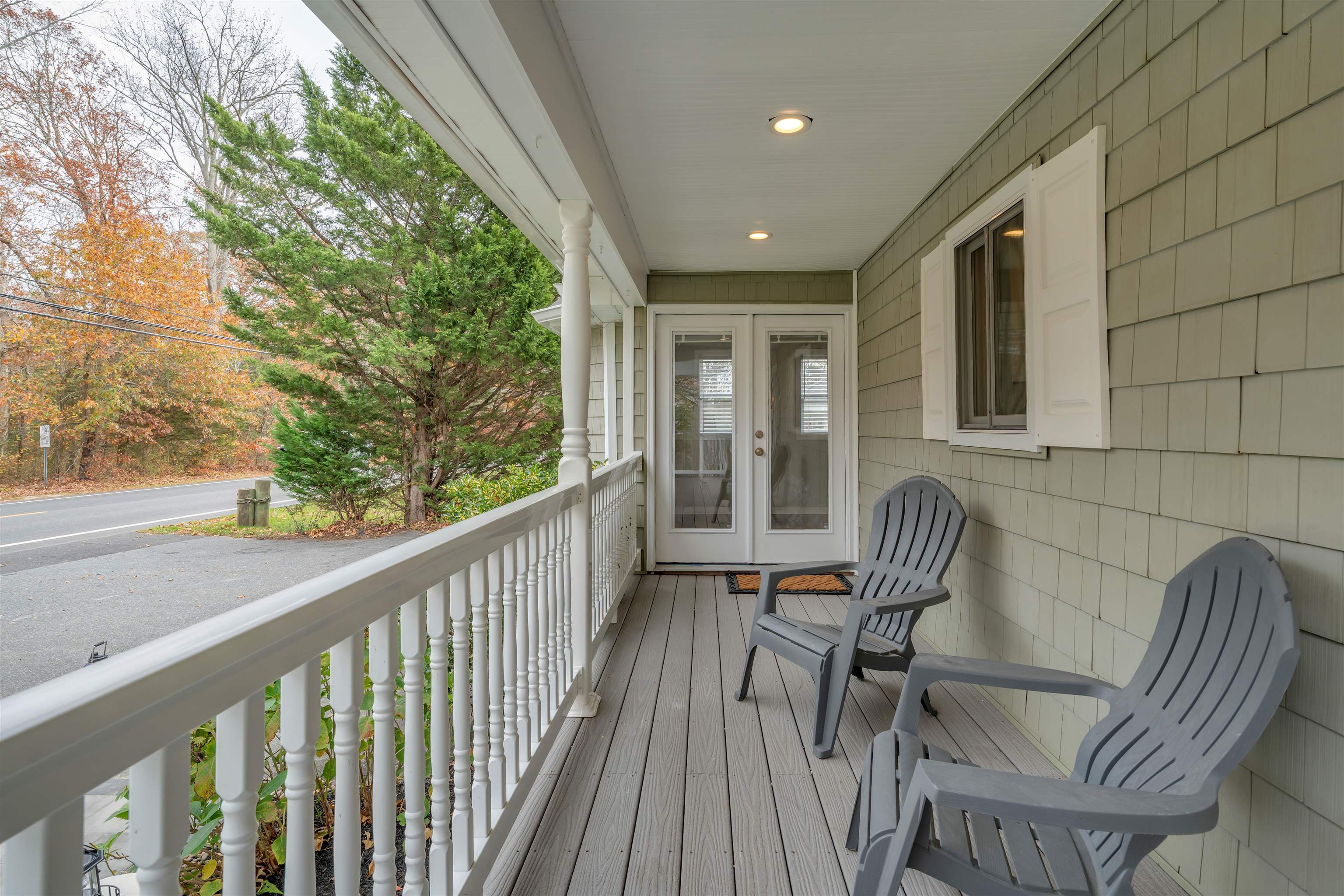 667 Dias Creek Road Cape May Court House, NJ 08210 - Photo 4 of 43 a view of a chair and table in the balcony