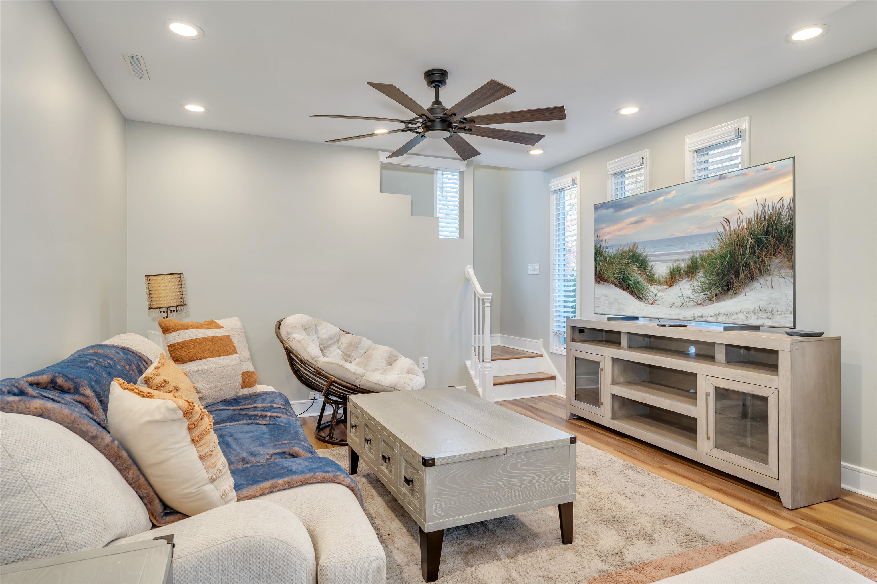 667 Dias Creek Road Cape May Court House, NJ 08210 - Photo 6 of 43 a living room with furniture and a flat screen tv