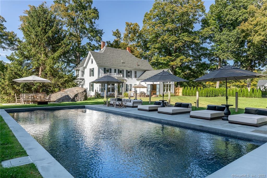 49 Christian Street Washington, CT 06777 - Photo 1 of 40 swimming pool view with a seating space
