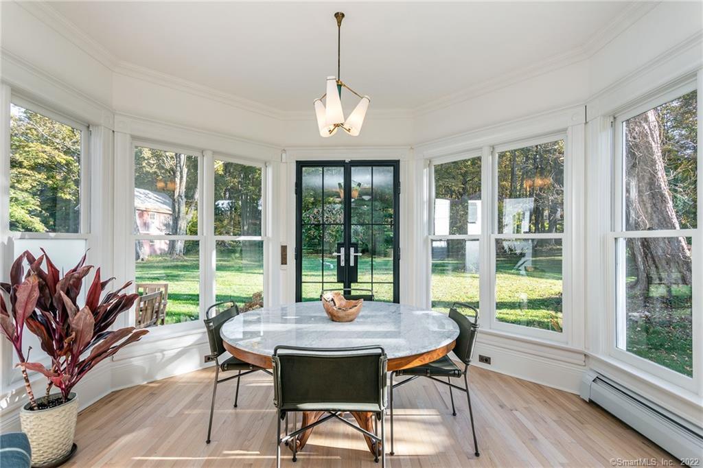 49 Christian Street Washington, CT 06777 - Photo 17 of 40 a view of a dining room with furniture window and outside view