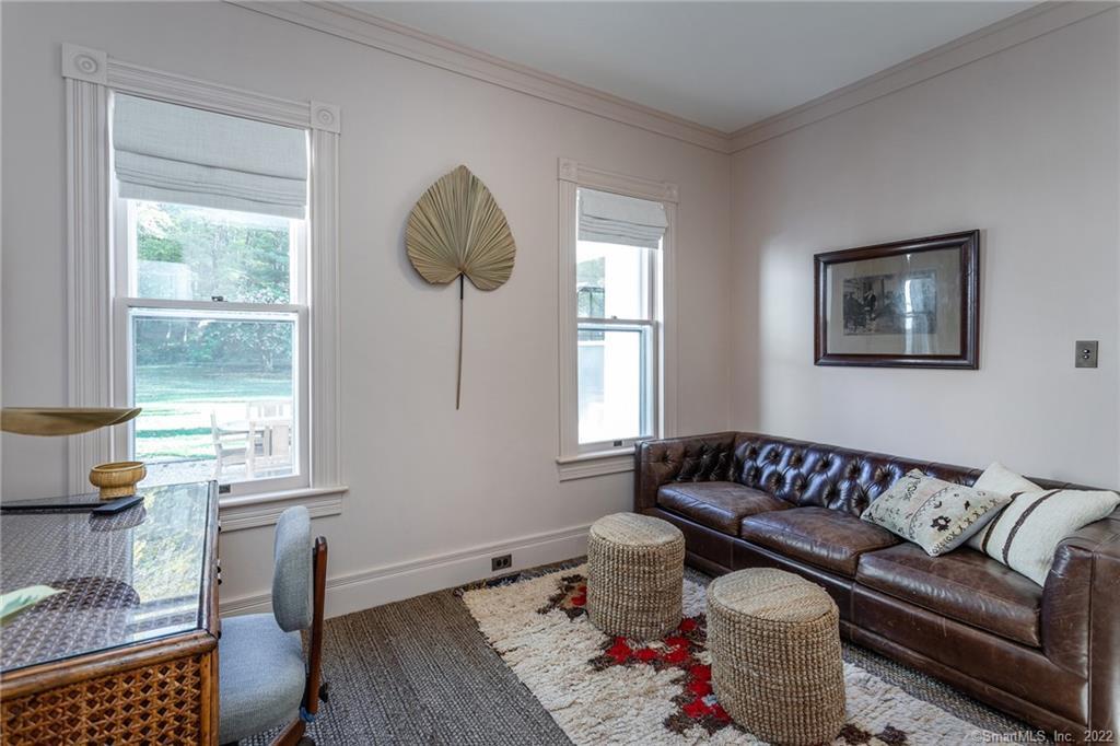 49 Christian Street Washington, CT 06777 - Photo 20 of 40 a living room with furniture and a window
