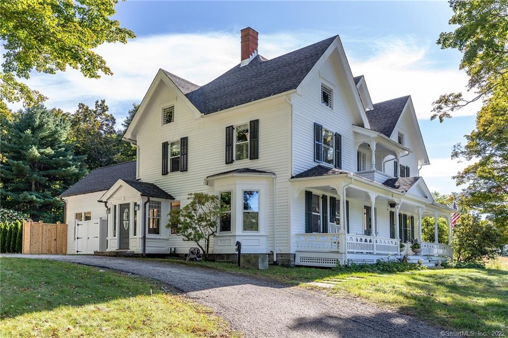 49 Christian Street Washington, CT 06777 - Photo 34 of 40 a front view of a house with a yard