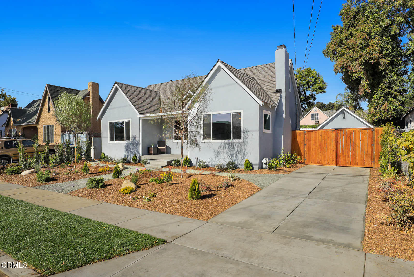 487 Crosby Street Altadena, CA 91001 - Photo 2 of 24 a front view of a house with yard patio and fire pit
