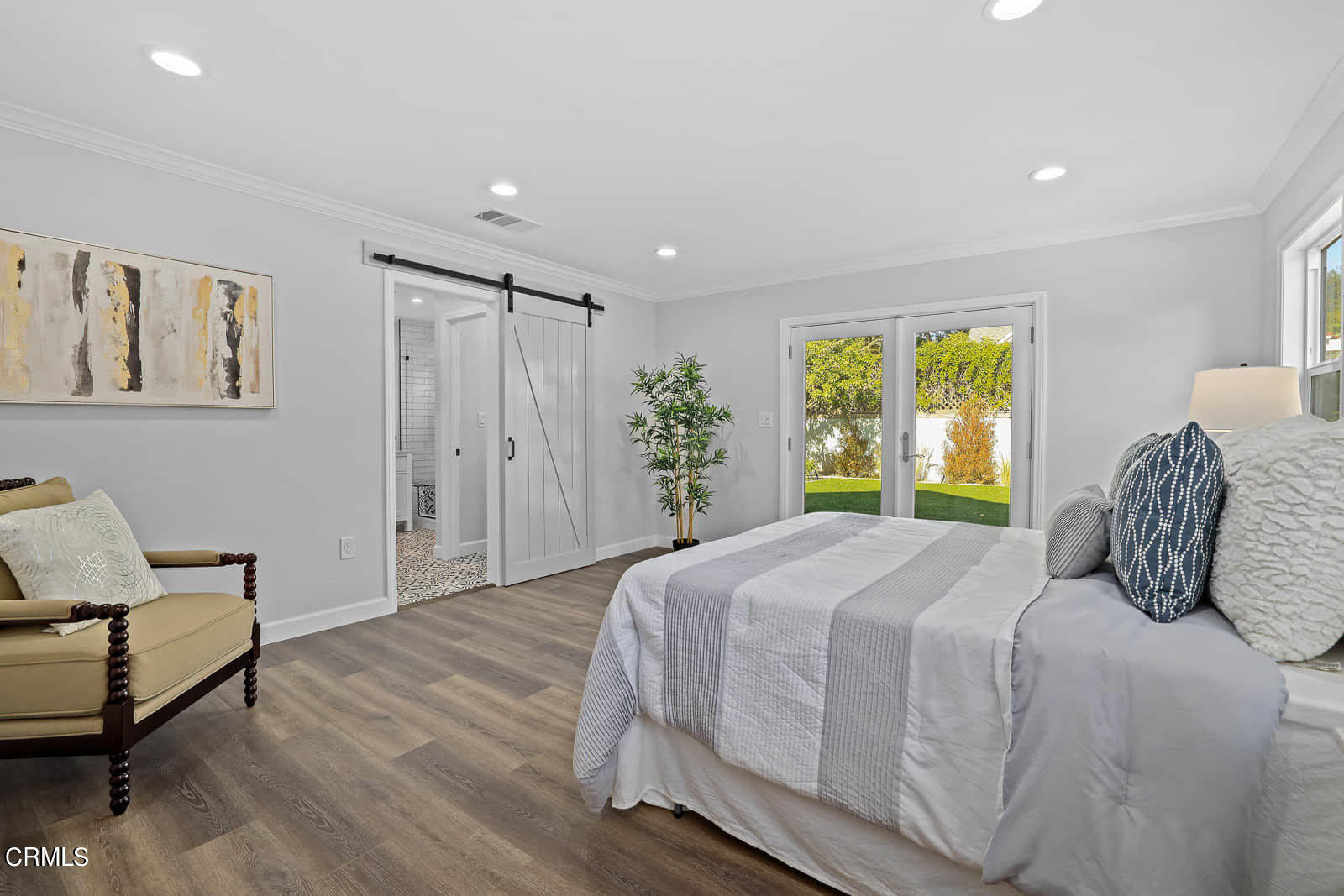 487 Crosby Street Altadena, CA 91001 - Photo 17 of 24 a bedroom with a large bed and a window