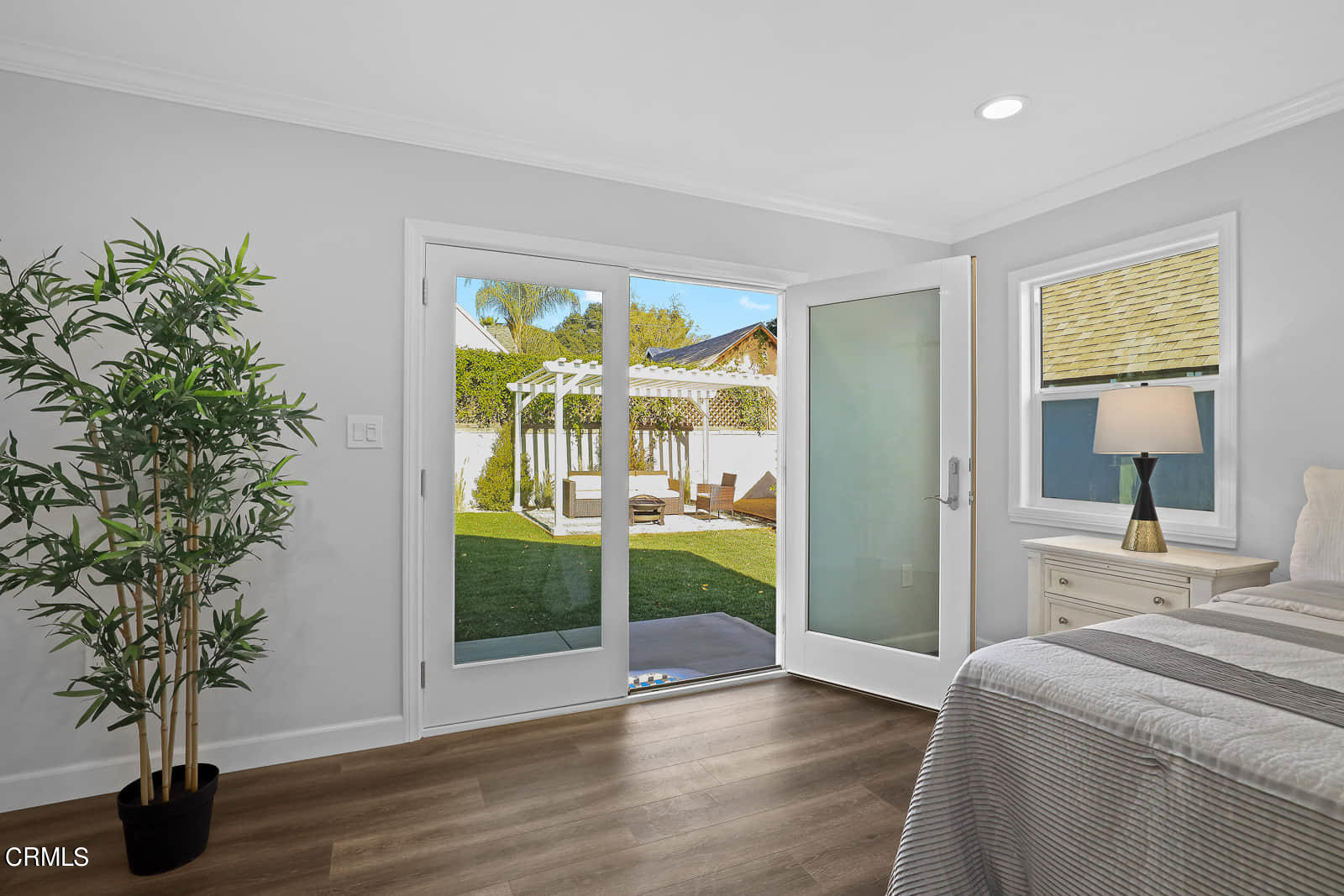 487 Crosby Street Altadena, CA 91001 - Photo 20 of 24 a bedroom with furniture and large windows