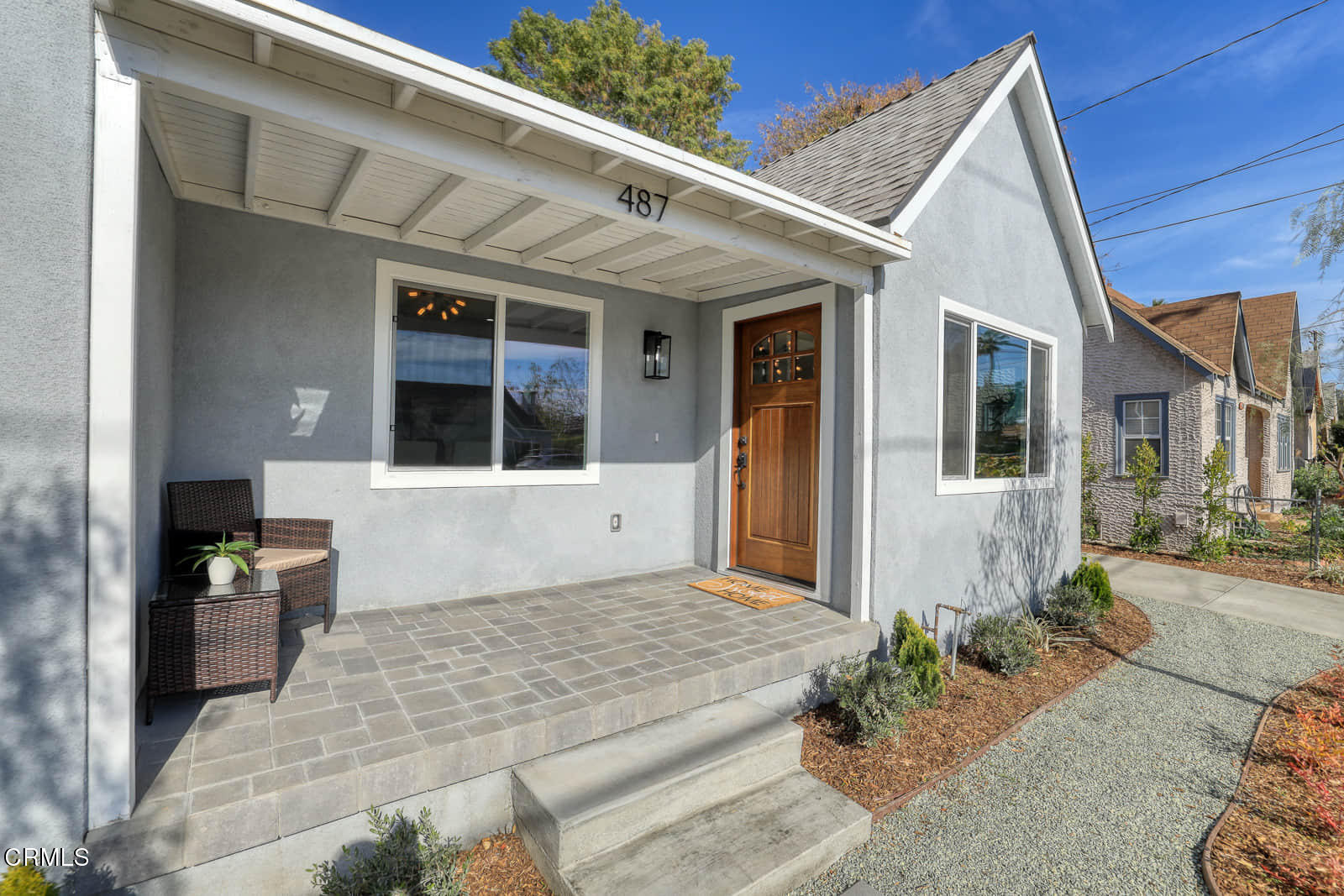 487 Crosby Street Altadena, CA 91001 - Photo 4 of 24 a front view of a house with a yard