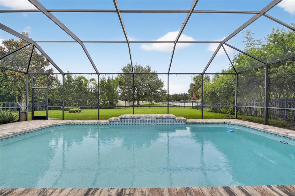 7223 Bowspirit Place Apollo Beach, FL 33572 - Photo 2 of 92 a view of a swimming pool with lounge chair