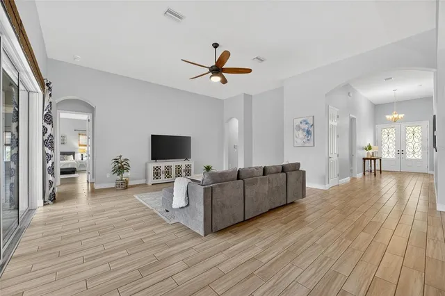 an aerial view of a house with swimming pool yard and outdoor seating