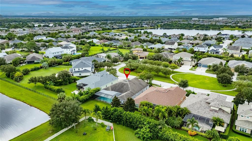 7223 Bowspirit Place Apollo Beach, FL 33572 - Photo 71 of 92 an aerial view of a house with a garden