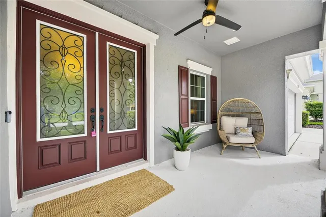 a kitchen with kitchen island stainless steel appliances a sink a stove top oven a counter space and cabinets