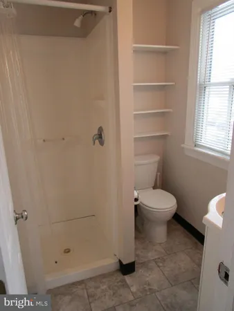 a bathroom with a toilet