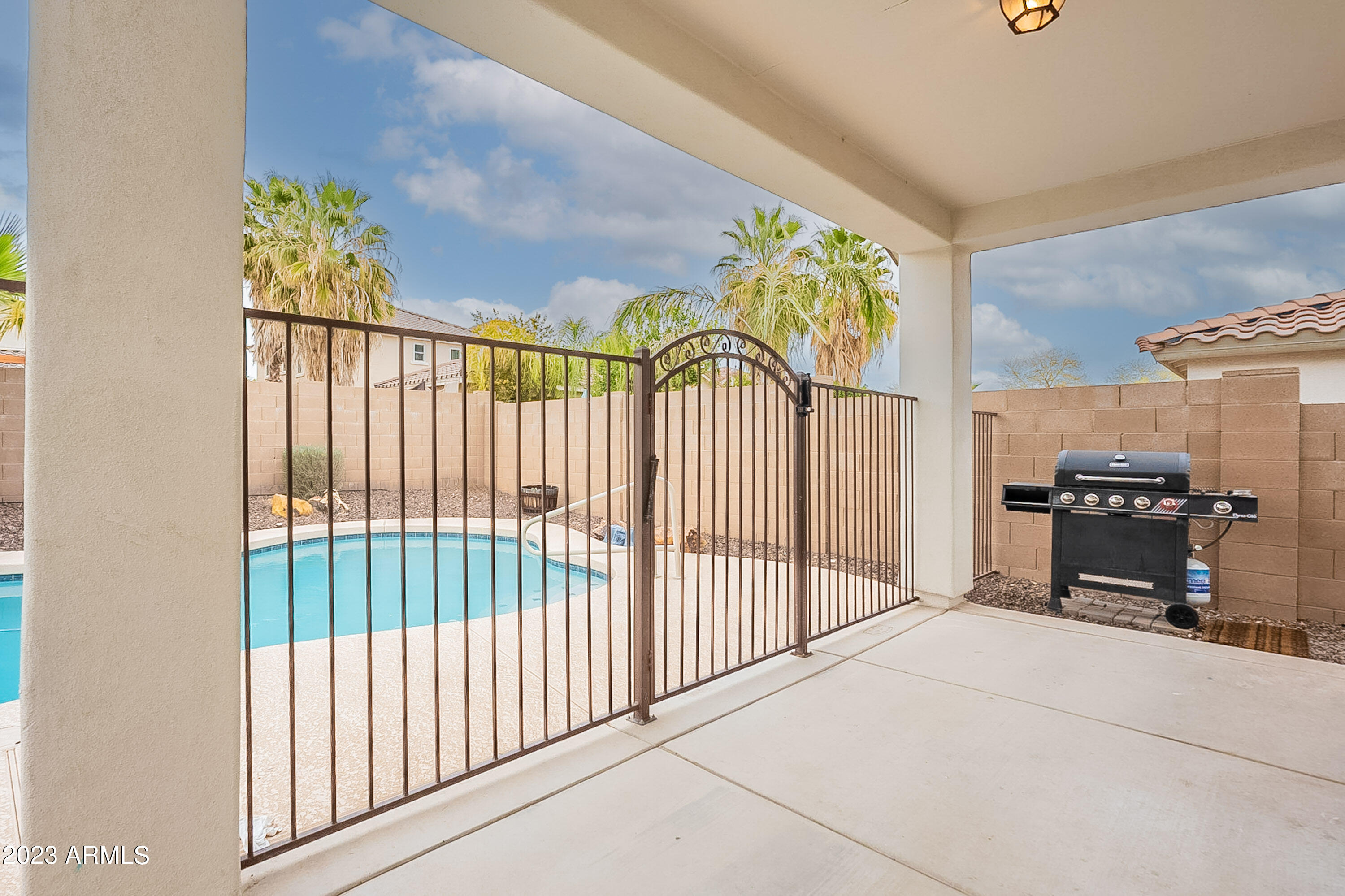 18158 West Hatcher Road Waddell, AZ 85355 - Photo 33 of 44 Covered Patio