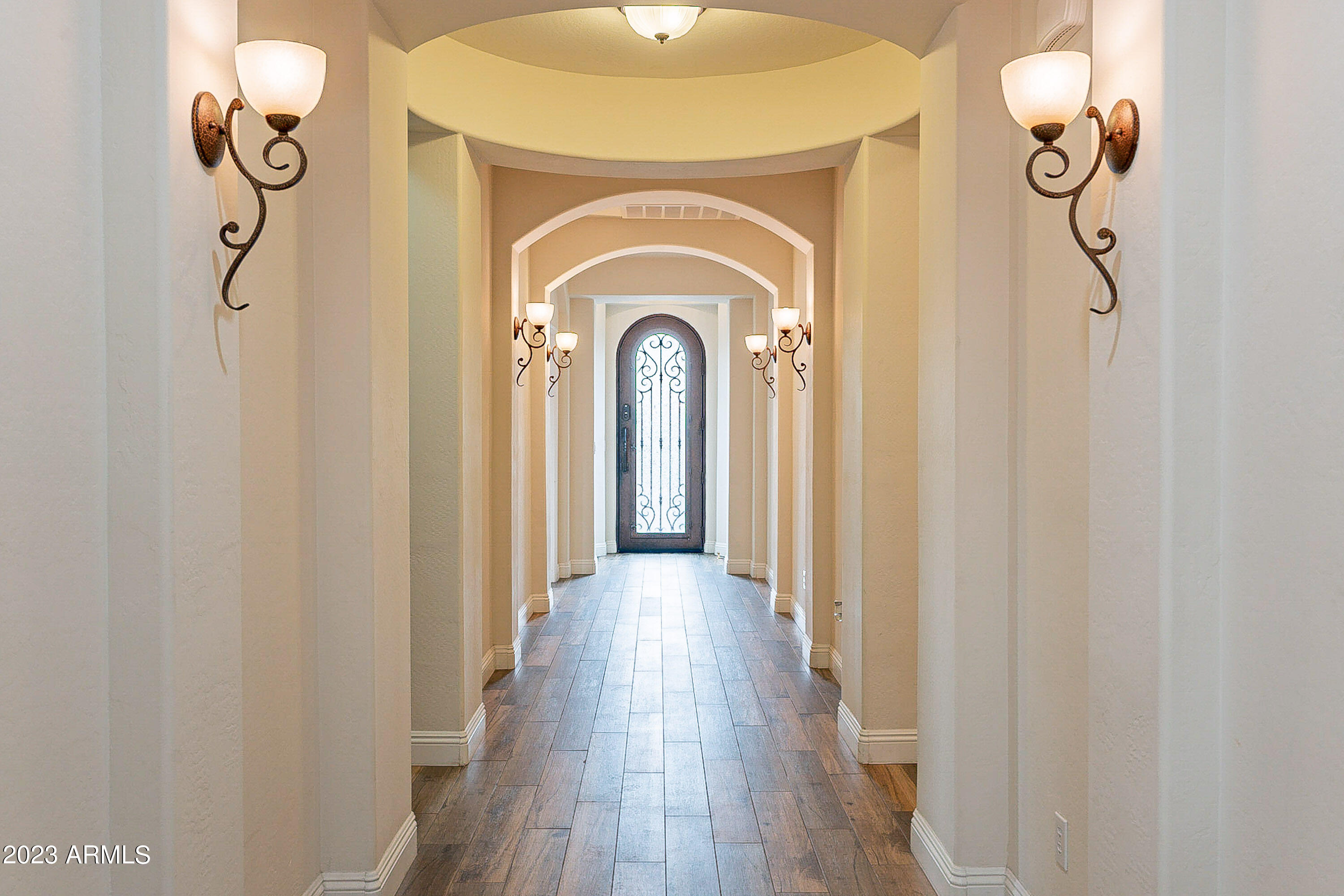 18158 West Hatcher Road Waddell, AZ 85355 - Photo 4 of 44 Entry Hallway & Iron Door