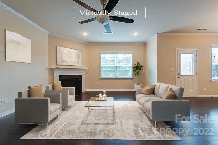 210 Keating Pl Drive Fort Mill, SC 29708 - Photo 3 of 20 a living room with furniture and a fireplace