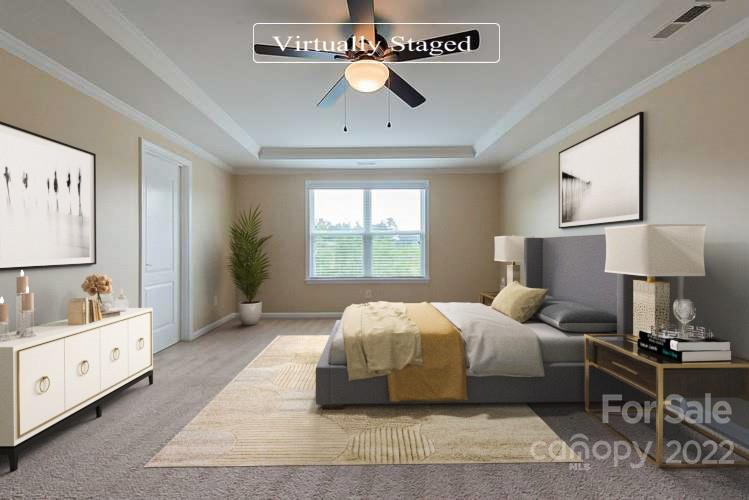 210 Keating Pl Drive Fort Mill, SC 29708 - Photo 8 of 20 a bedroom with a large bed and a window