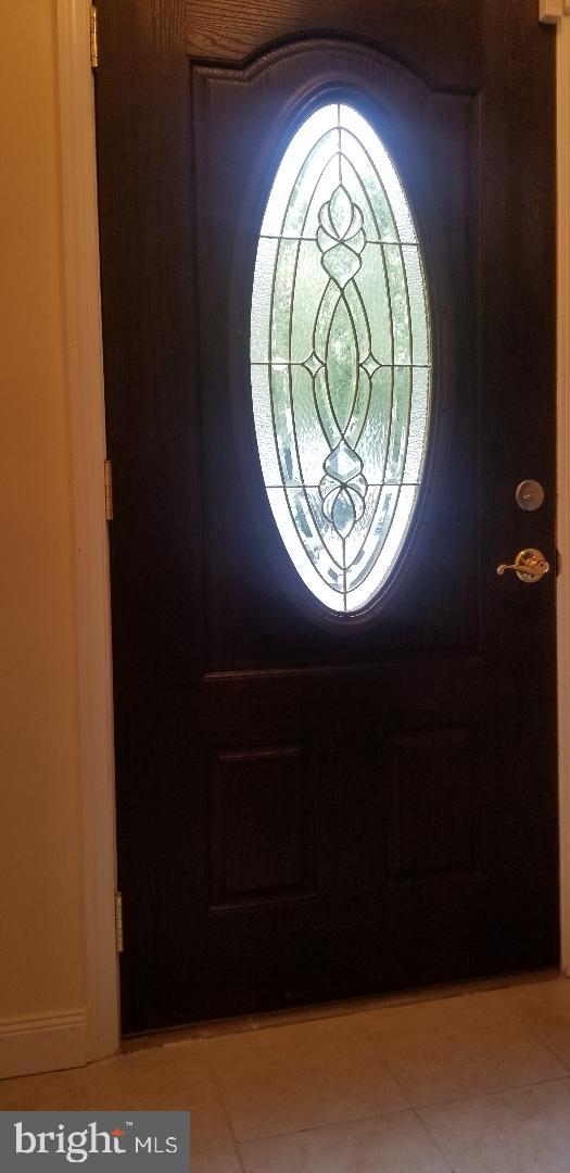 6307 Clinton Way Clinton, MD 20735 - Photo 9 of 28 Foyer front door