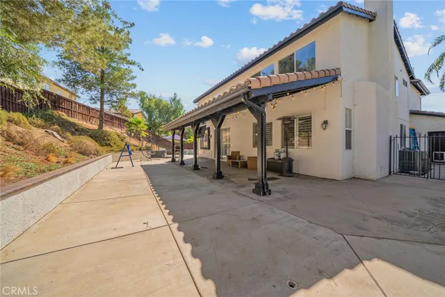 a very nice looking house with large windows