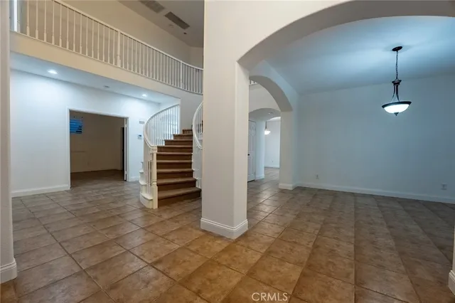 a view of a livingroom with a staircase