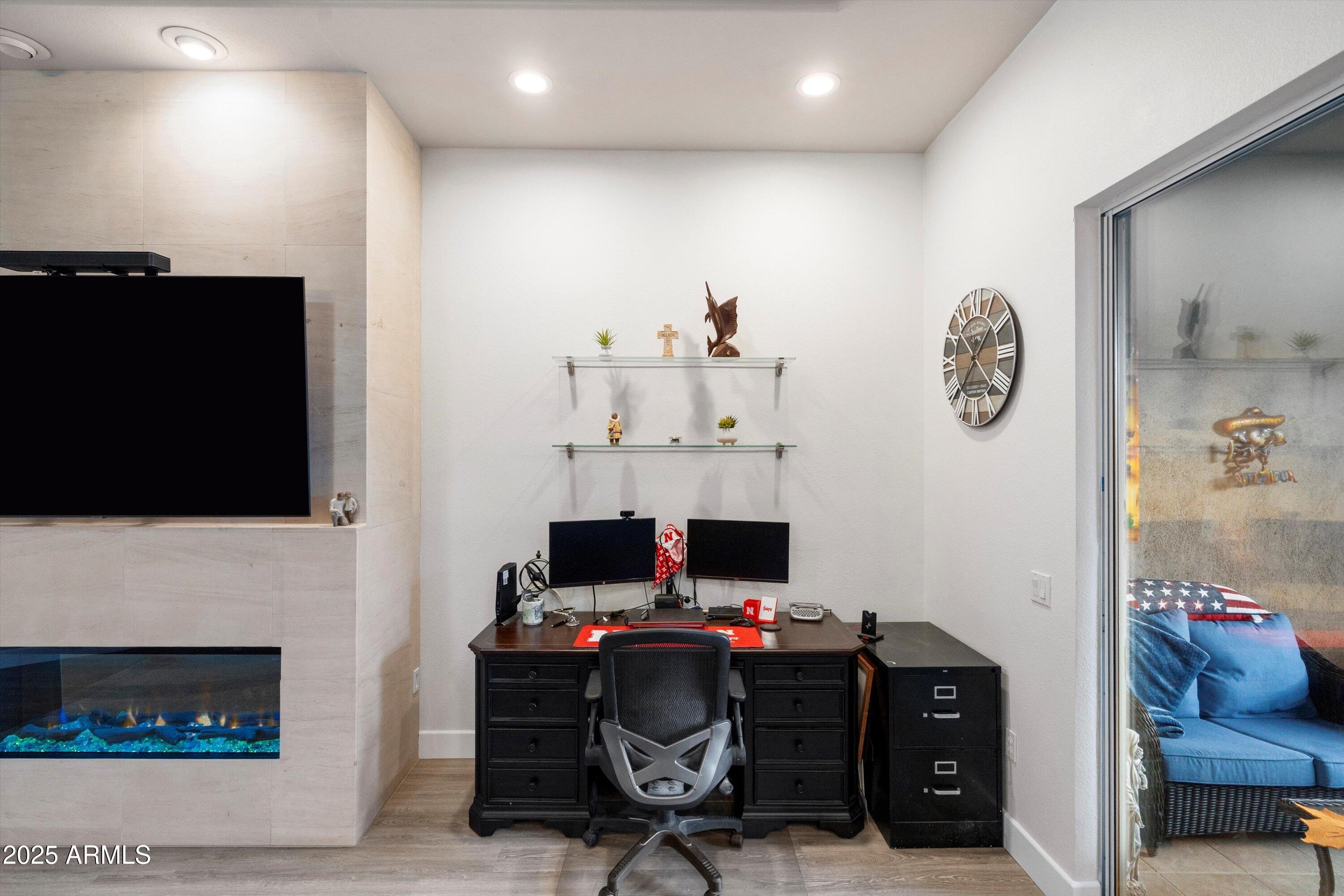 8245 East Bell Road, Unit 250 Scottsdale, AZ 85260 - Photo 12 of 48 a view of workspace with a flat screen tv