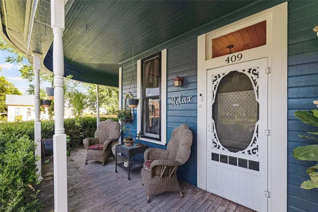 a view of a two chair in the balcony