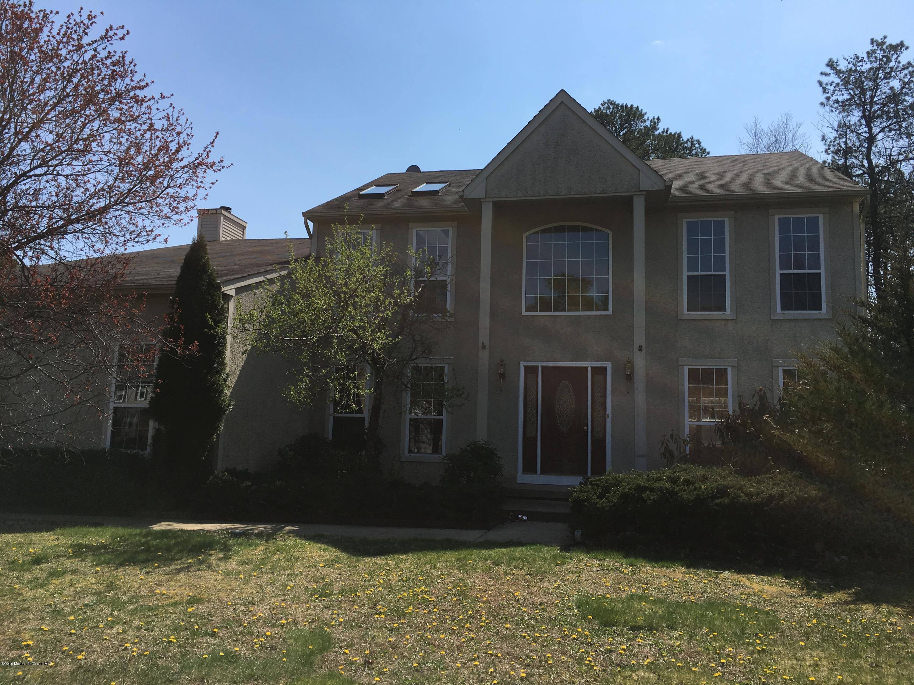 761 Anderson Road Jackson, NJ 08527 - Photo 1 of 22 a front view of house with yard