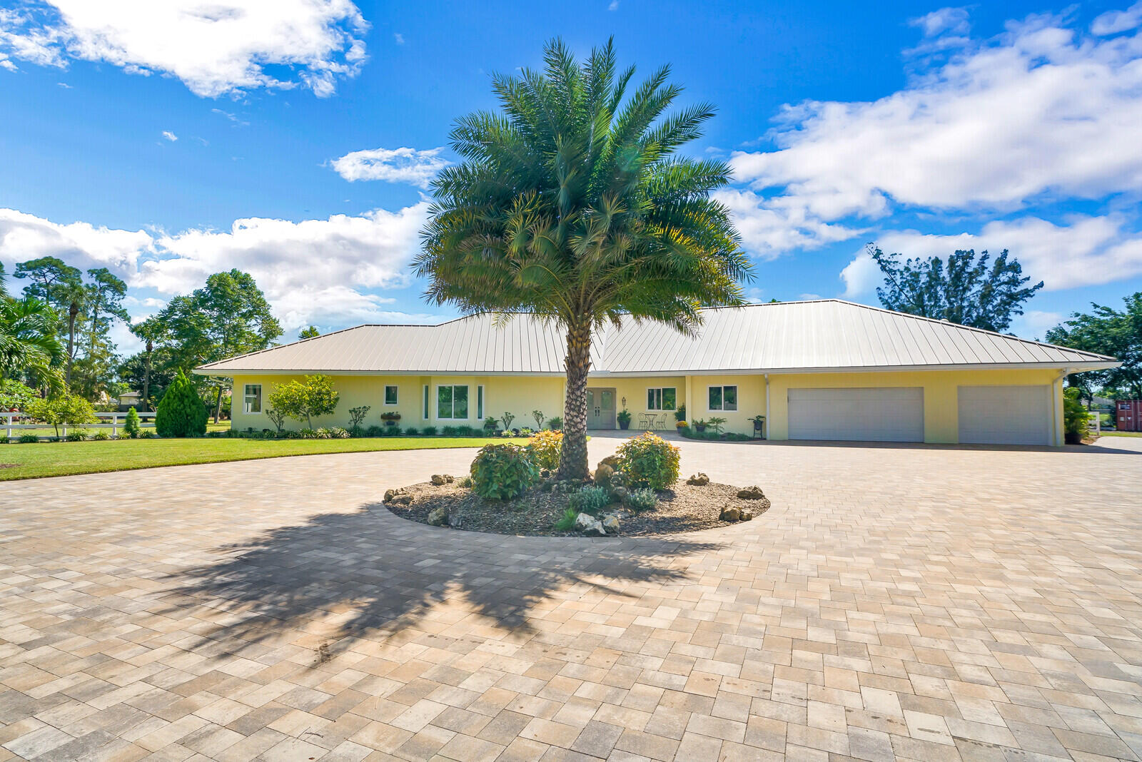 6624 Dillman Road Greenacres, FL 33413 - Photo 12 of 61 a front view of house with yard and swimming pool