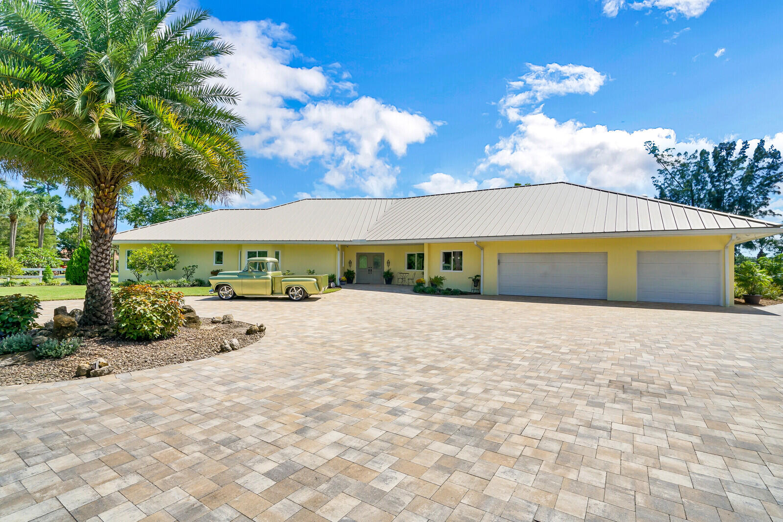 6624 Dillman Road Greenacres, FL 33413 - Photo 15 of 61 a view of an house with backyard and tree
