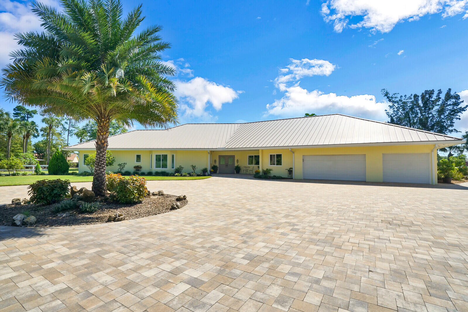 6624 Dillman Road Greenacres, FL 33413 - Photo 16 of 61 a view of an outdoor space and swimming pool