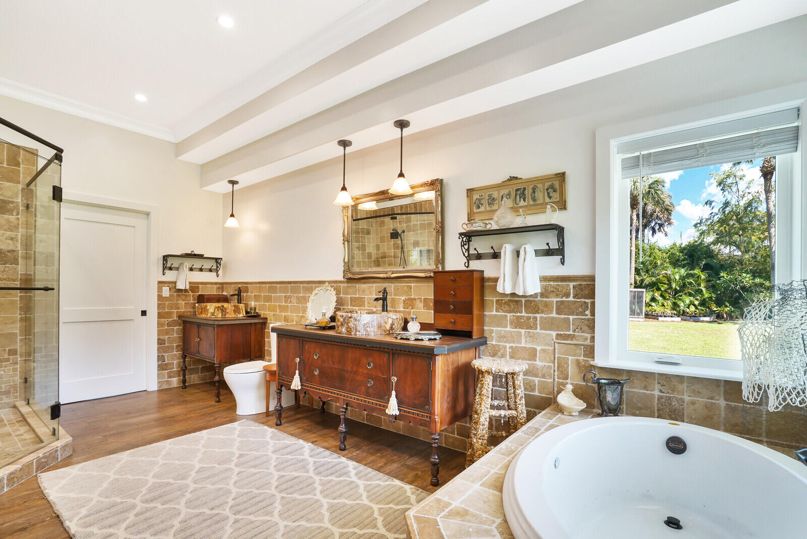 6624 Dillman Road Greenacres, FL 33413 - Photo 26 of 61 a bathroom with a sink mirror and a bathtub