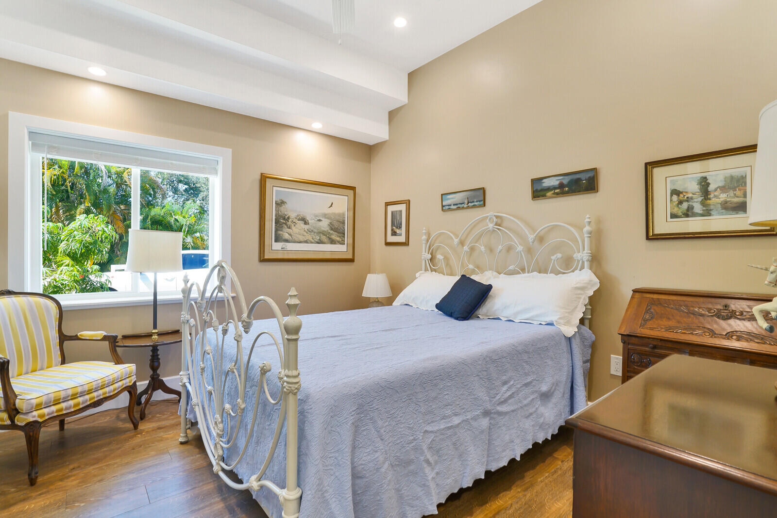 6624 Dillman Road Greenacres, FL 33413 - Photo 34 of 61 a bedroom with a bed a couch and a large window