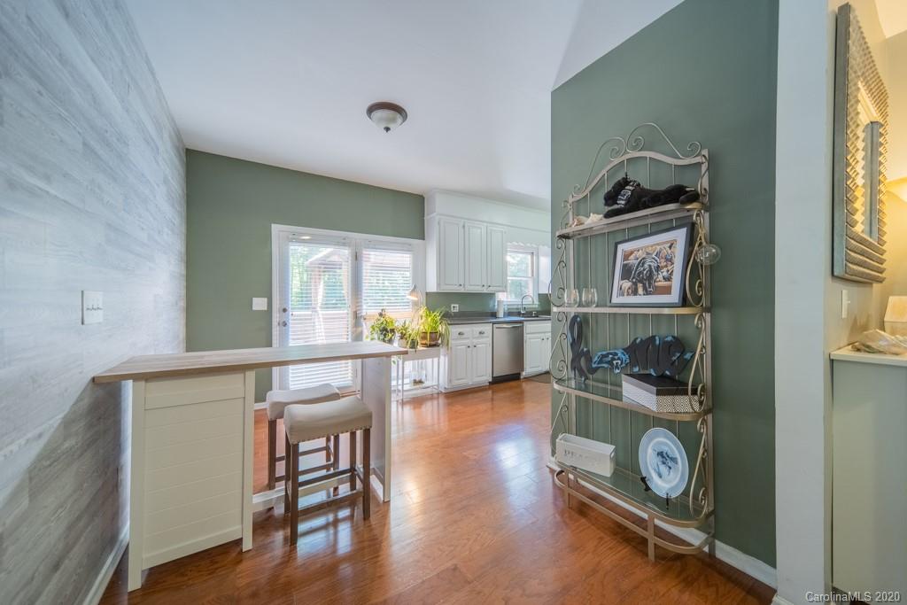 3440 Dobys Bridge Road Fort Mill, SC 29715 - Photo 13 of 25 a living room with furniture and a wooden floor