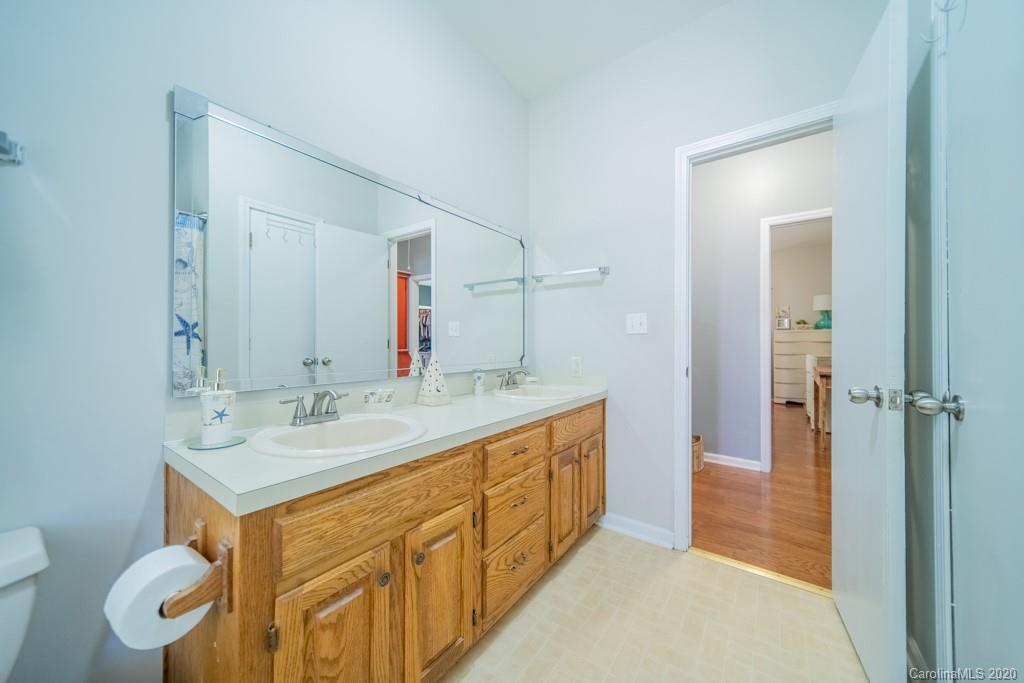 3440 Dobys Bridge Road Fort Mill, SC 29715 - Photo 21 of 25 a bathroom with a sink vanity granite and toilet
