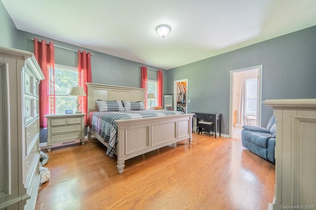 3440 Dobys Bridge Road Fort Mill, SC 29715 - Photo 22 of 25 a bedroom with furniture and a bed