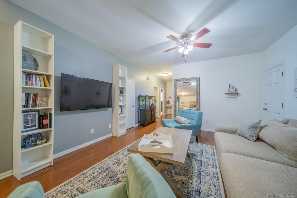 3440 Dobys Bridge Road Fort Mill, SC 29715 - Photo 9 of 25 a living room with furniture and a flat screen tv
