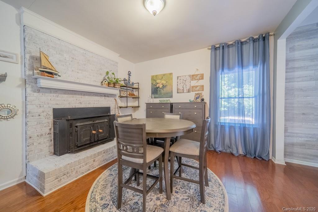 3440 Dobys Bridge Road Fort Mill, SC 29715 - Photo 10 of 25 a view of a livingroom with furniture and a fireplace