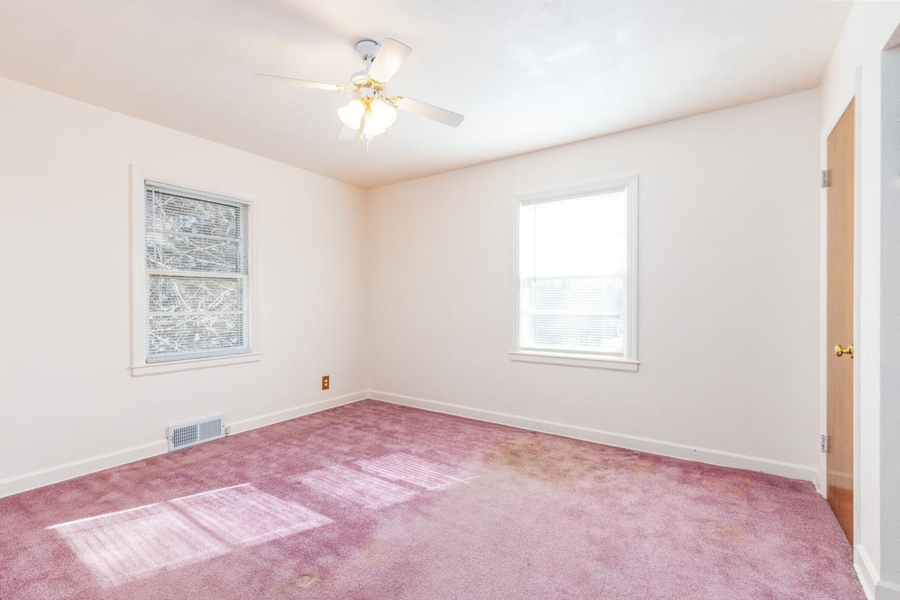 1554 Rural Street Rockford, IL 61107 - Photo 12 of 25 a view of an empty room with a window